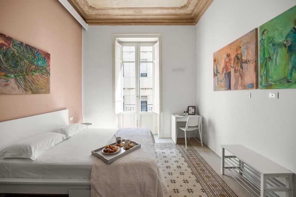 Postel nebo postele na pokoji v ubytování Palazzo Amazigh