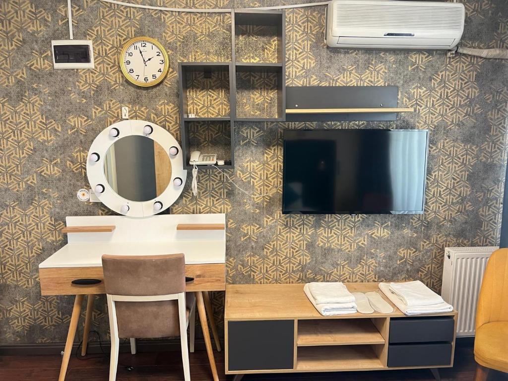 TV a/nebo společenská místnost v ubytování Middle Village