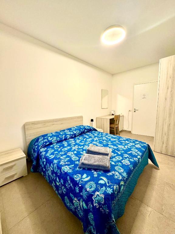 Postel nebo postele na pokoji v ubytování *Veranda's rooms* - Free parking in central Lugano