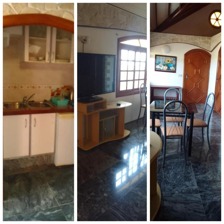 TV a/nebo společenská místnost v ubytování Residencial Cabo Verde Palace