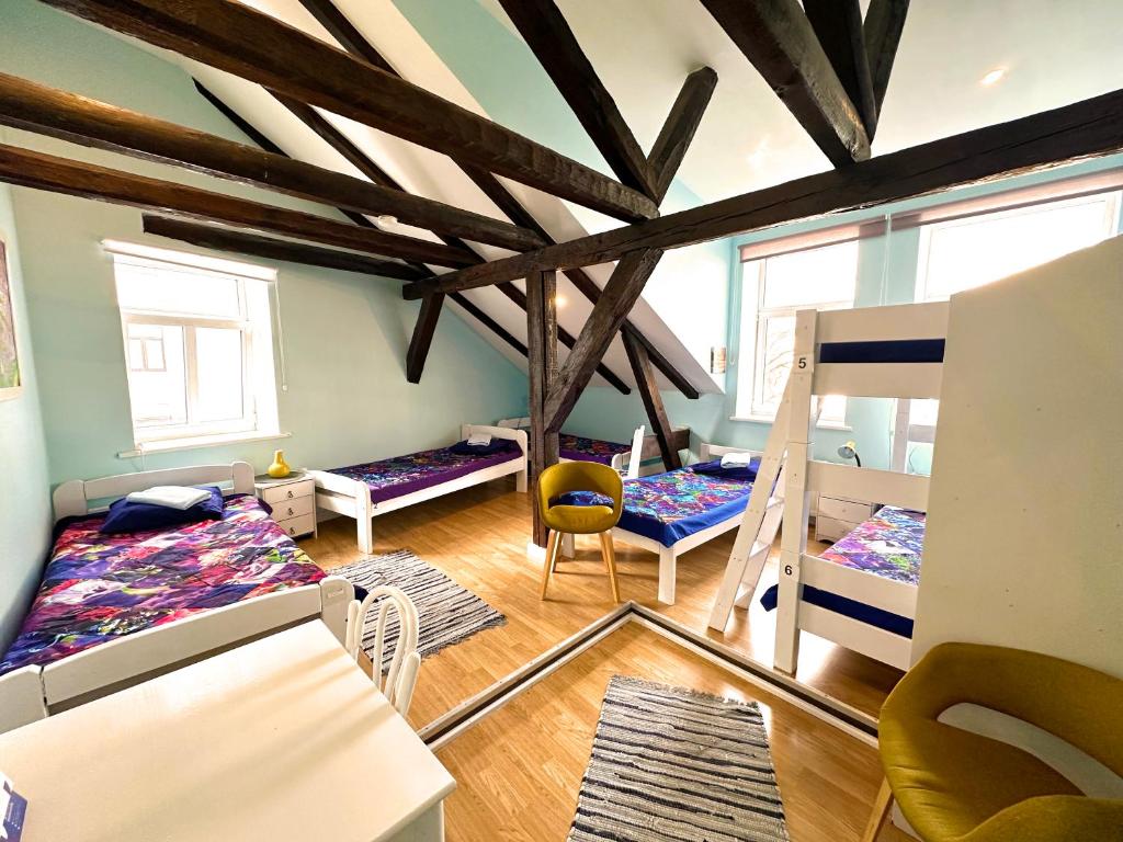 Postel nebo postele na pokoji v ubytování Central Hostel
