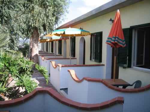 Patio o area all'aperto di Albergo Villa Hibiscus