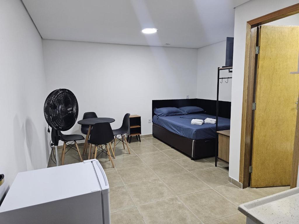 Ένα ή περισσότερα κρεβάτια σε δωμάτιο στο Studio Vila Prudente Mooca