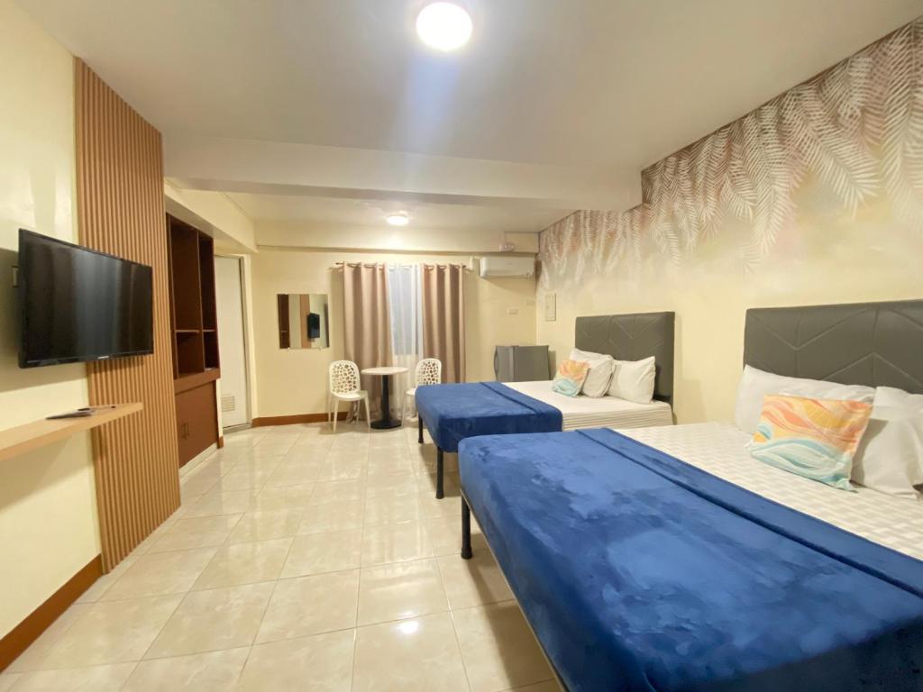 TV a/nebo společenská místnost v ubytování Boracay Grace Hotel