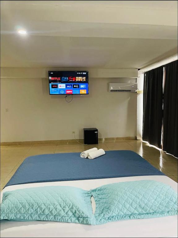 Letto o letti in una camera di Gorgona Beach House