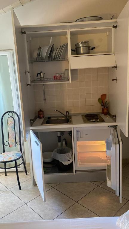 Kuchyň nebo kuchyňský kout v ubytování Residence VAPORE