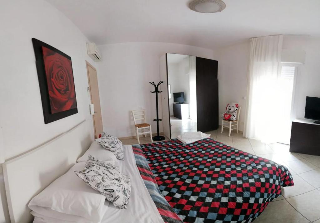 Postel nebo postele na pokoji v ubytování Residence VAPORE