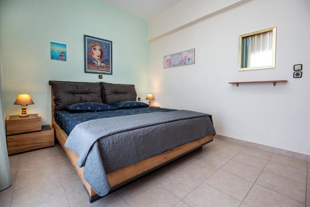 Łóżko lub łóżka w pokoju w obiekcie "Thea" Apartment 1