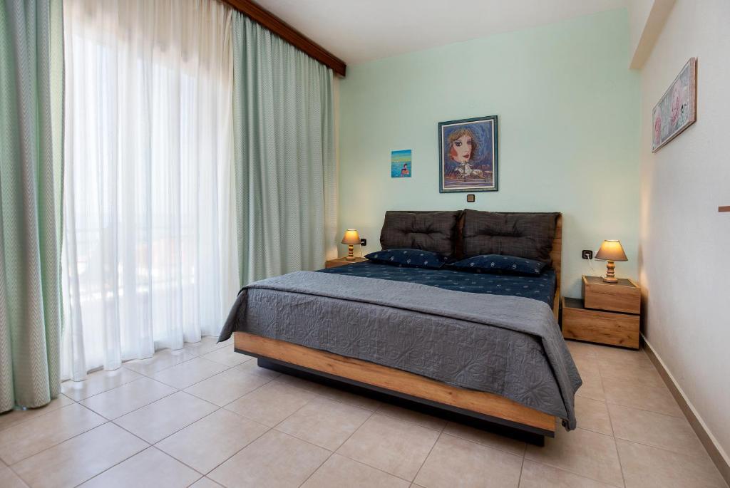 Łóżko lub łóżka w pokoju w obiekcie "Thea" Apartment 1