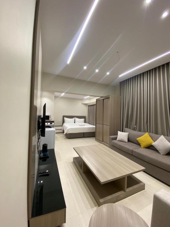 Ένα ή περισσότερα κρεβάτια σε δωμάτιο στο WATEEL apartment