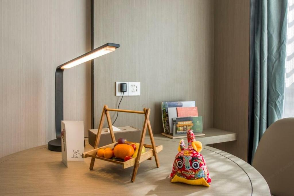 Posezení v ubytování Mehood Lestie International Hotel Linhexi Guangzhou East Railway Station Branch - Free Shuttle Bus to Canton Fair Complex During Canton Fair Period & Free afternoon tea & Free midnight snack & Free VPN Internet Access