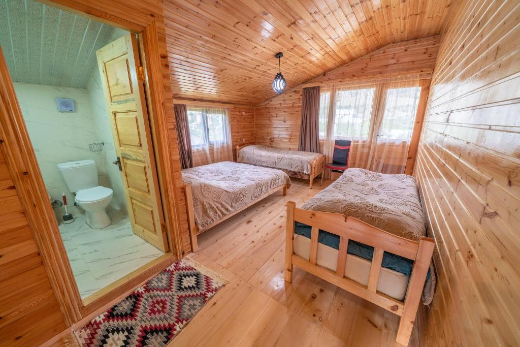 Letto o letti in una camera di Ioane's Chalet