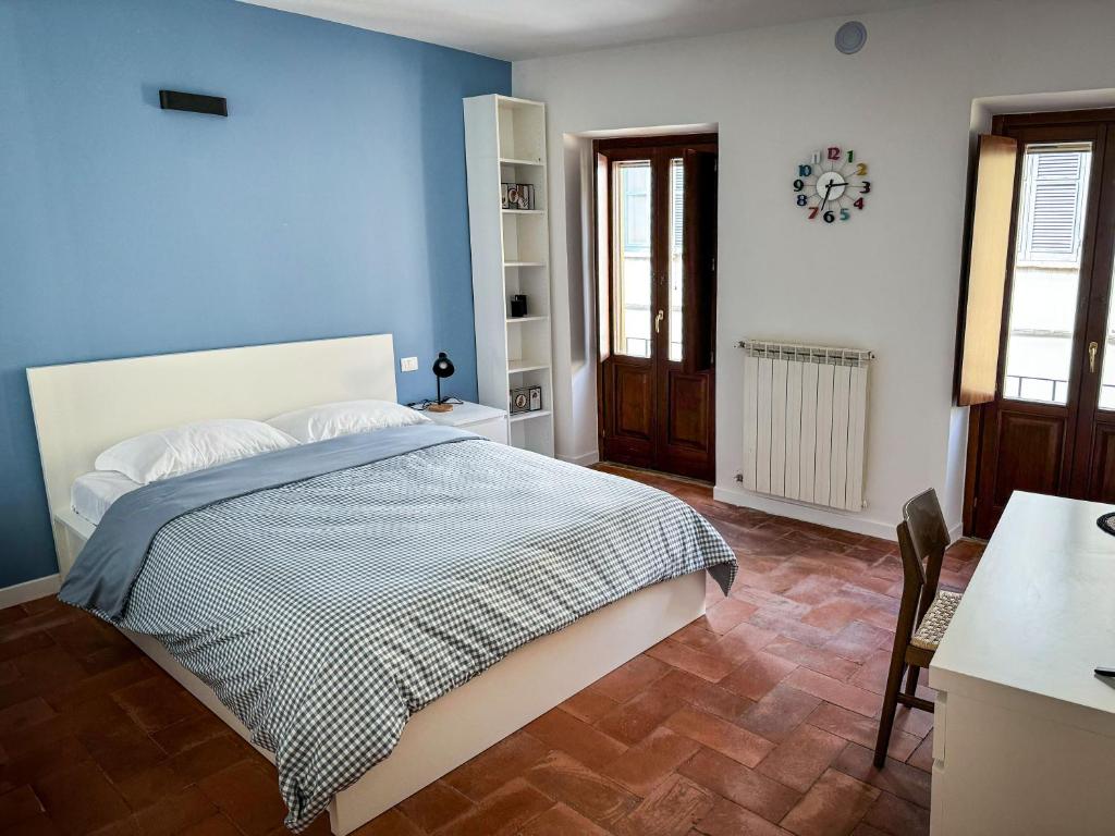 Postel nebo postele na pokoji v ubytování Residenza Gonzaga