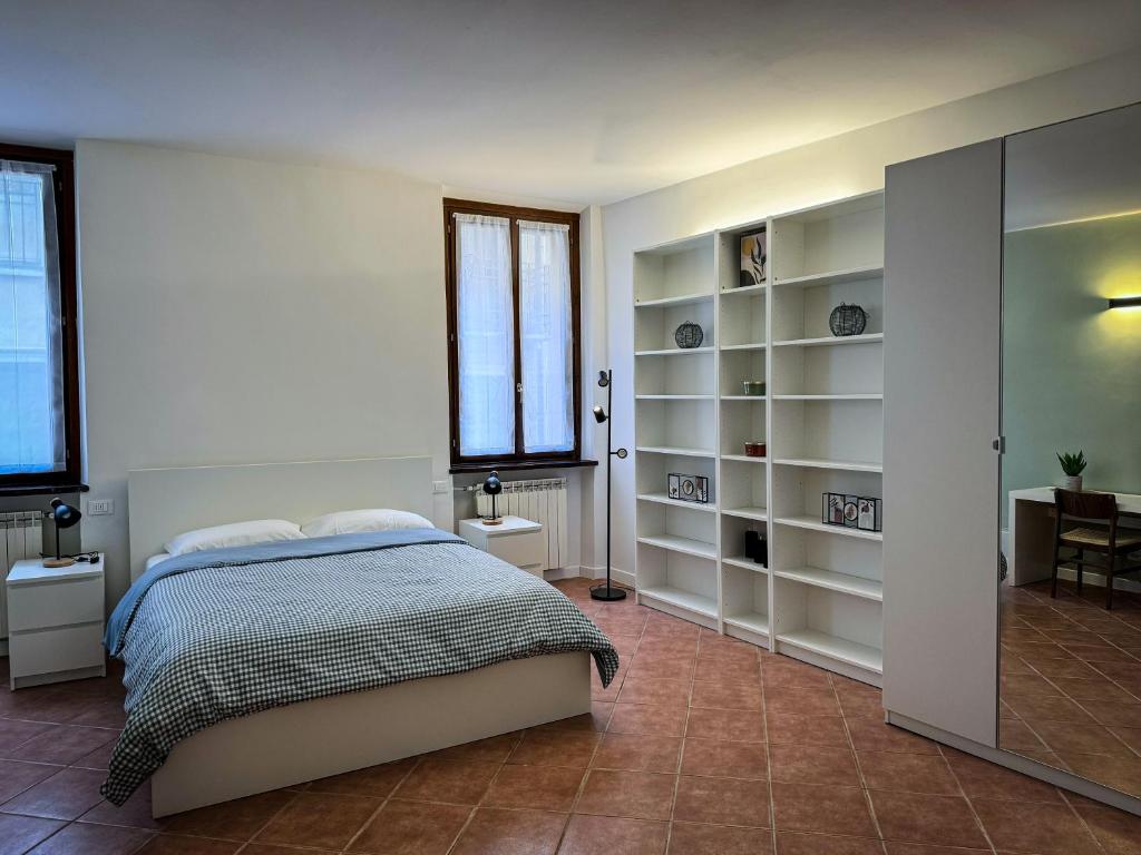 Postel nebo postele na pokoji v ubytování Residenza Gonzaga