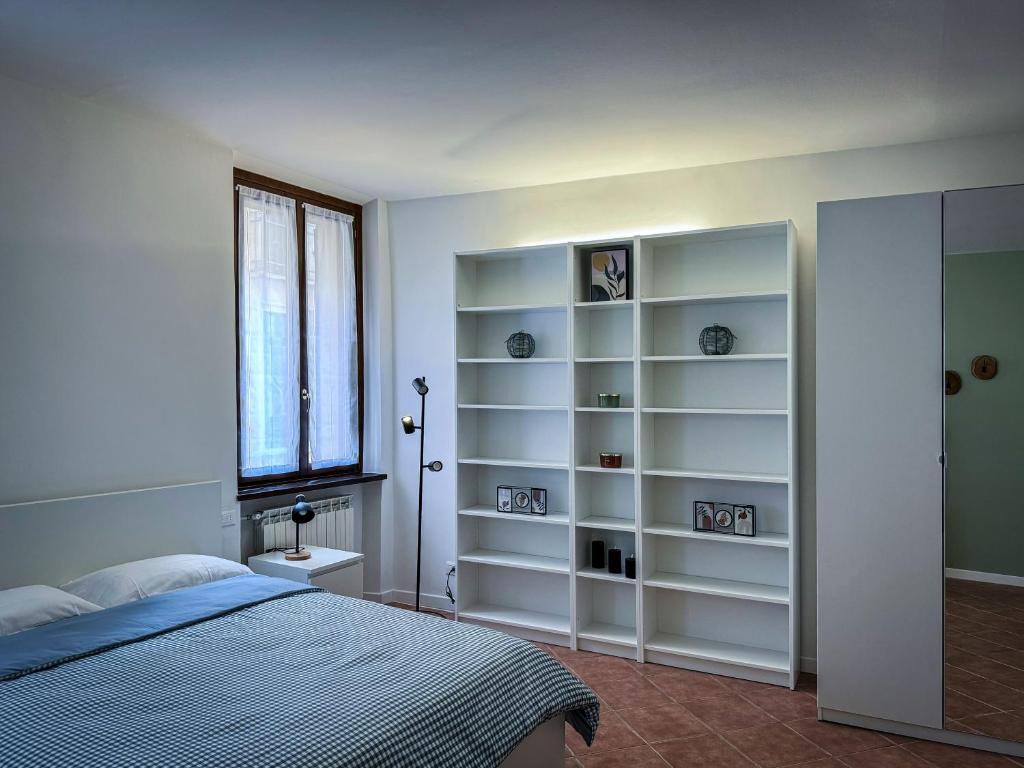 Postel nebo postele na pokoji v ubytování Residenza Gonzaga
