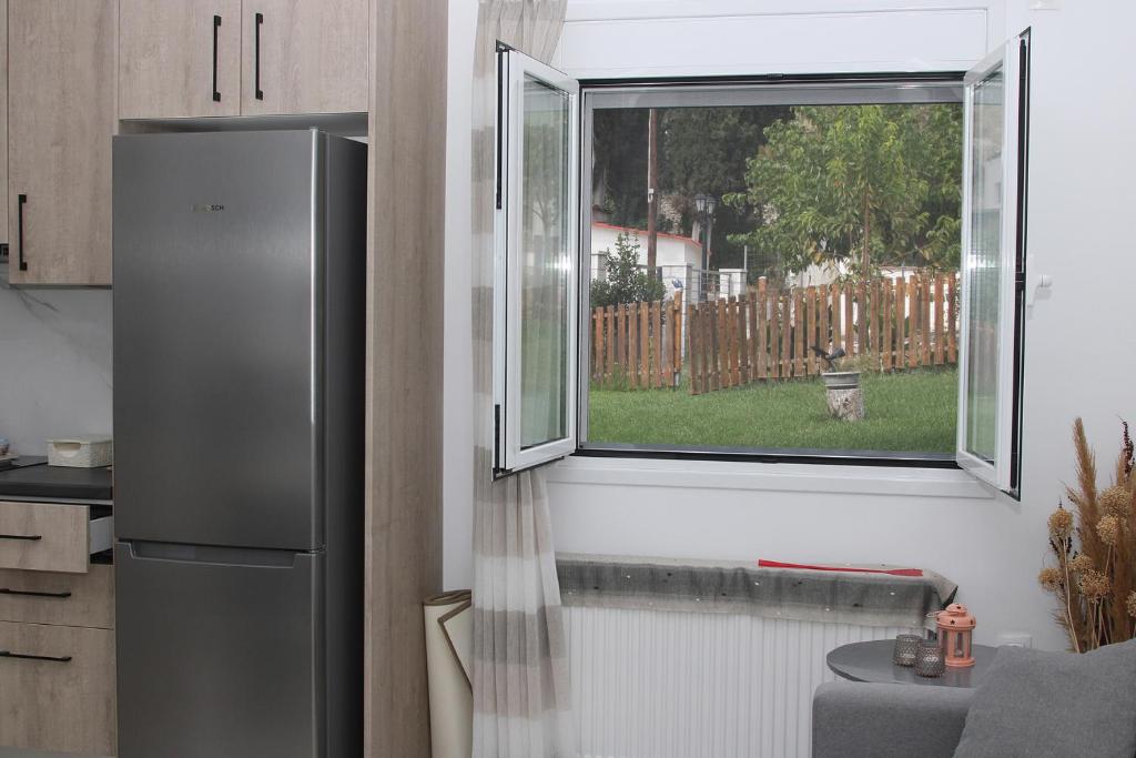 Kuchyň nebo kuchyňský kout v ubytování Vagelis Nemea apartments