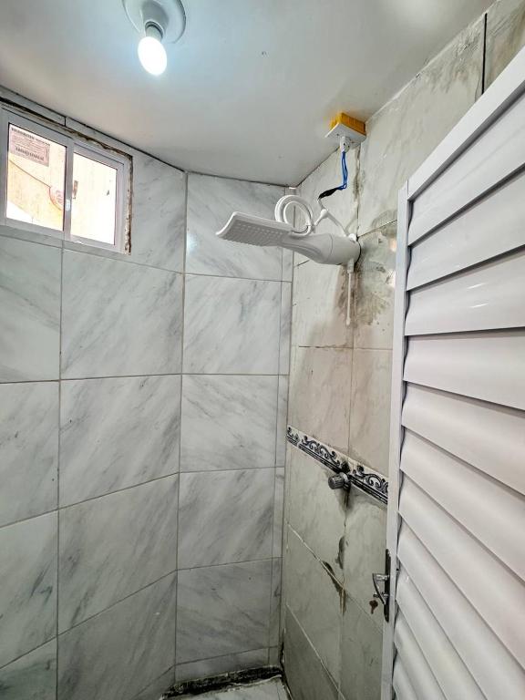Koupelna v ubytování Ap próximo ao Arco com garagem e ar