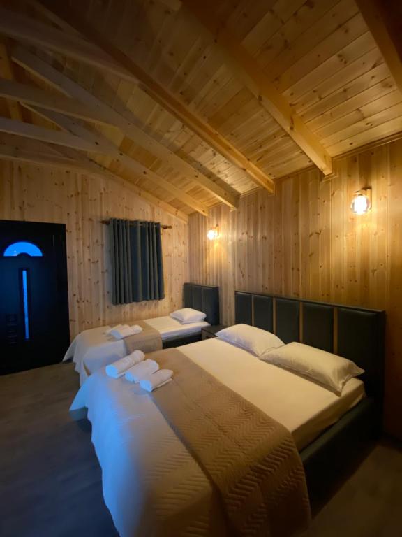 Postel nebo postele na pokoji v ubytování Guest House Dimal Berat