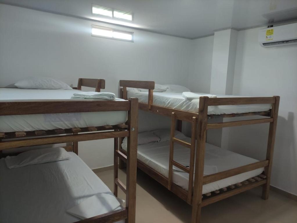 Postel nebo postele na pokoji v ubytování Apartamentos Villa Leonor