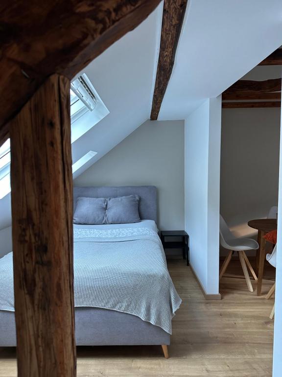 Postel nebo postele na pokoji v ubytování Weinblick am Rhein