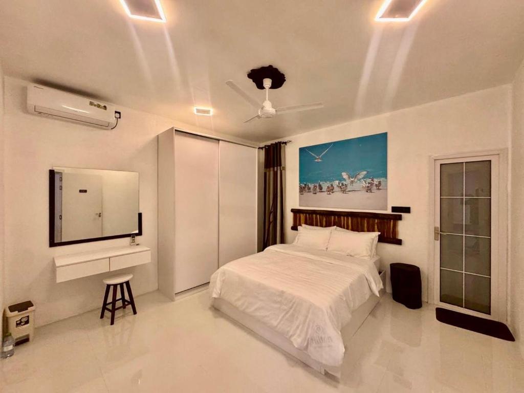 En eller flere senge i et værelse på Crystal sea inn