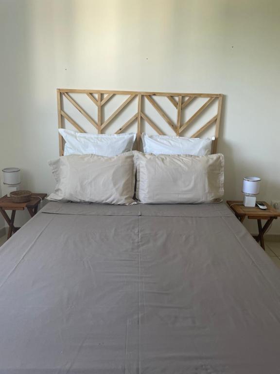 Postel nebo postele na pokoji v ubytování Appartement avec vue sur mer