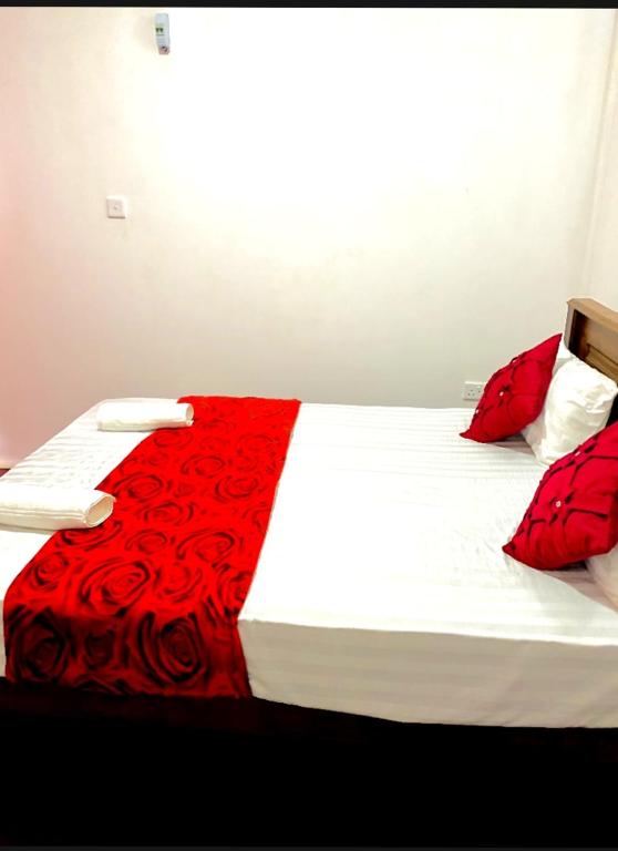 Postel nebo postele na pokoji v ubytování Ranuchanu Rockview Inn Ella