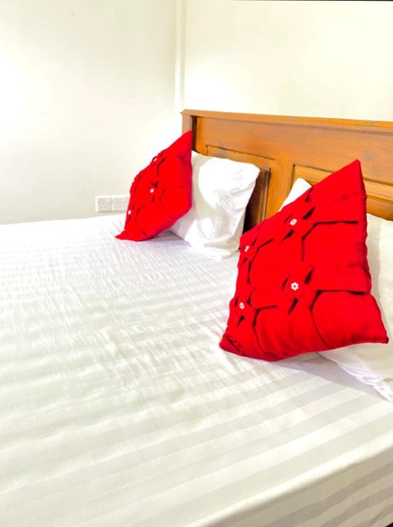Postel nebo postele na pokoji v ubytování Ranuchanu Rockview Inn Ella