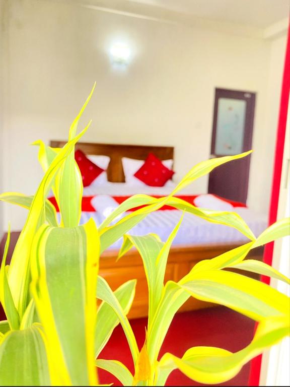 Postel nebo postele na pokoji v ubytování Ranuchanu Rockview Inn Ella