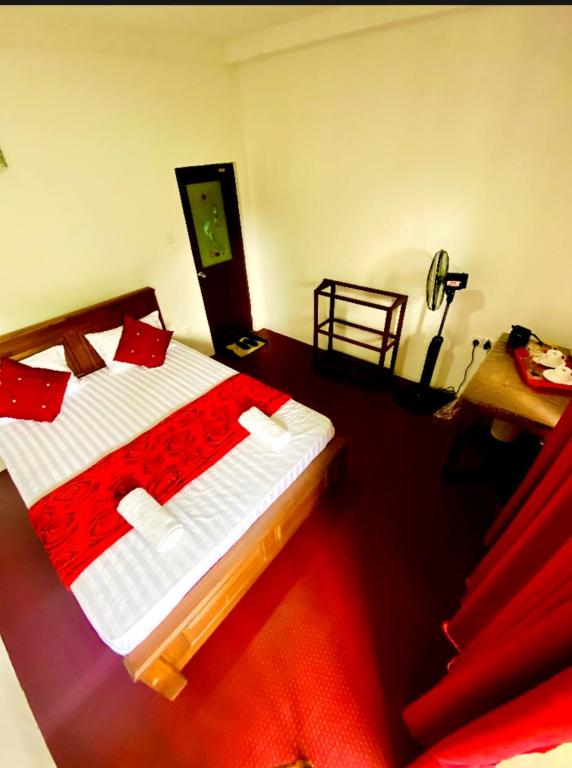 Postel nebo postele na pokoji v ubytování Ranuchanu Rockview Inn Ella