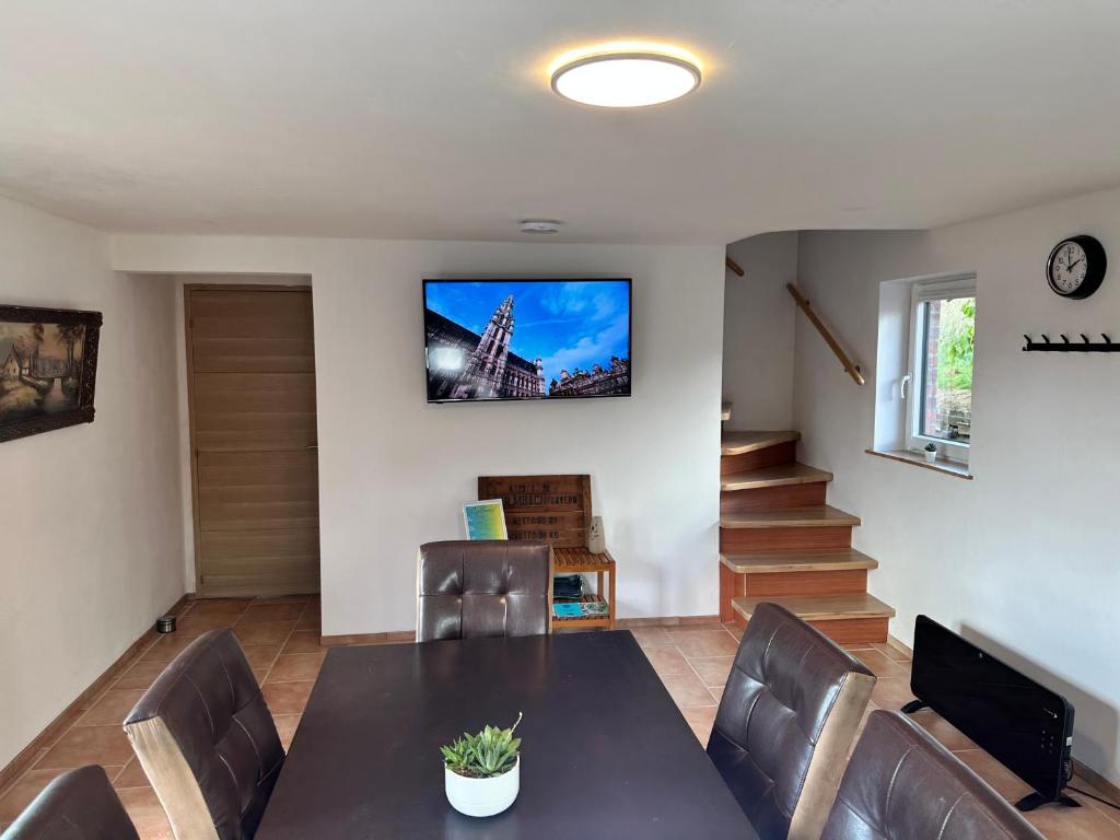 TV a/nebo společenská místnost v ubytování Sweet Home