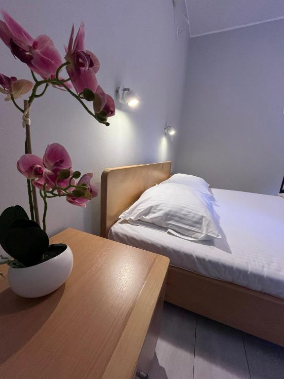 Postel nebo postele na pokoji v ubytování Flow House