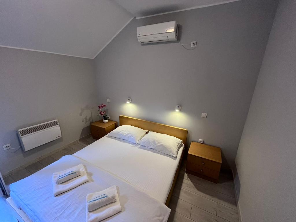 Postel nebo postele na pokoji v ubytování Flow House