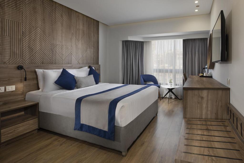 Pyramisa Suites Hotel Cairo - Chambre Lit King-Size De Luxe
