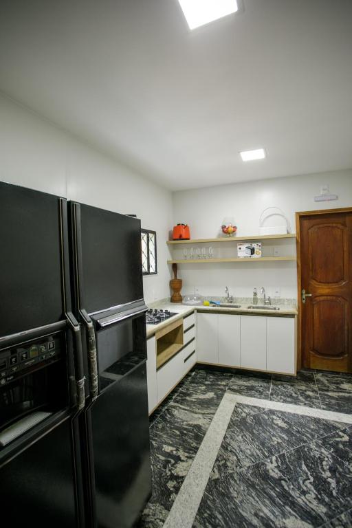 Kuchyň nebo kuchyňský kout v ubytování NaCasa Hostel