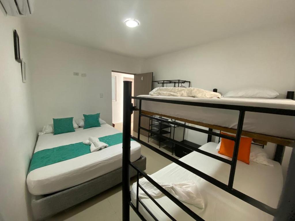 Postel nebo postele na pokoji v ubytování Shekinah House
