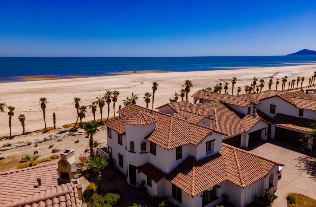 an aerial view of a house on the beach at Condo76-4 The STAR OF THE SEA - EL DORADO RANCH SAN FELIPE BEACH RENTAL in La Ponderosa