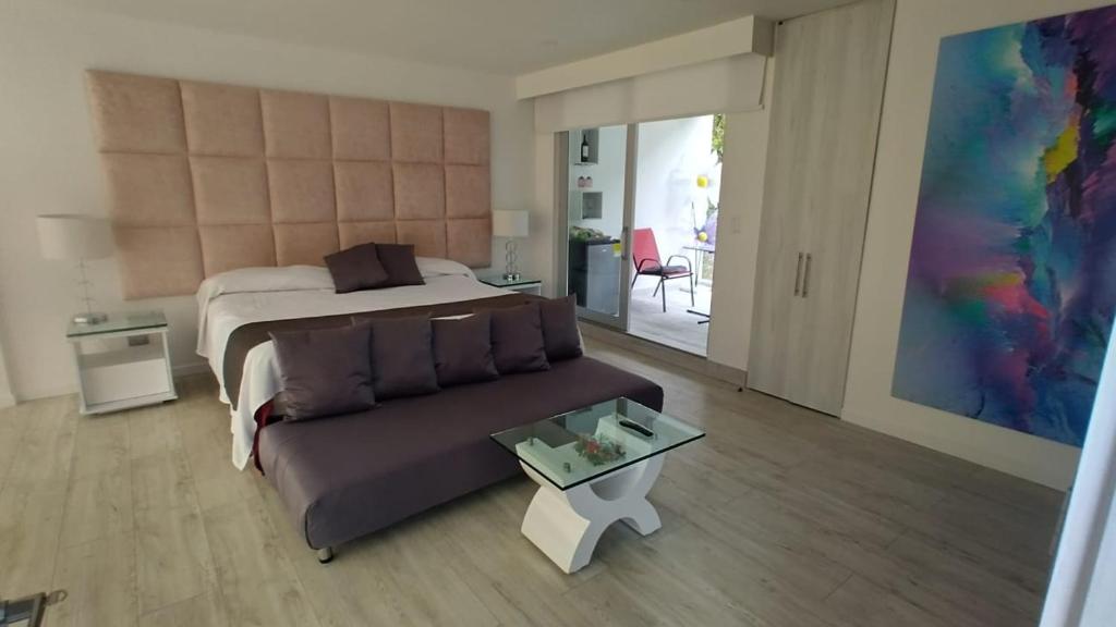 Postel nebo postele na pokoji v ubytování Mirador samsara Suite Luxury piso completo