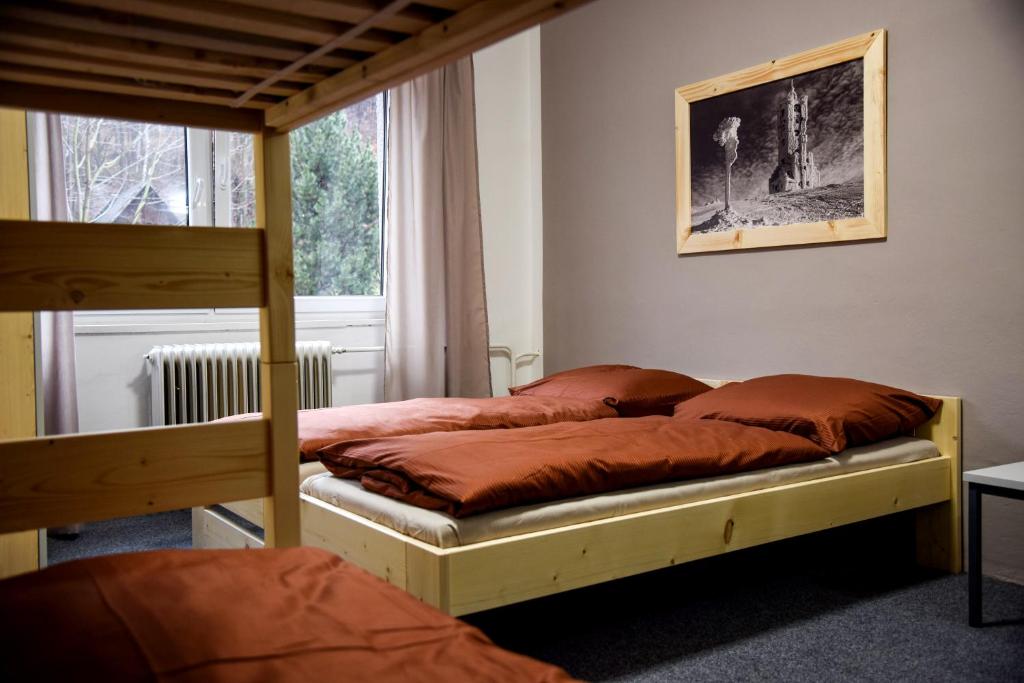 Postel nebo postele na pokoji v ubytování Penzion Kouty