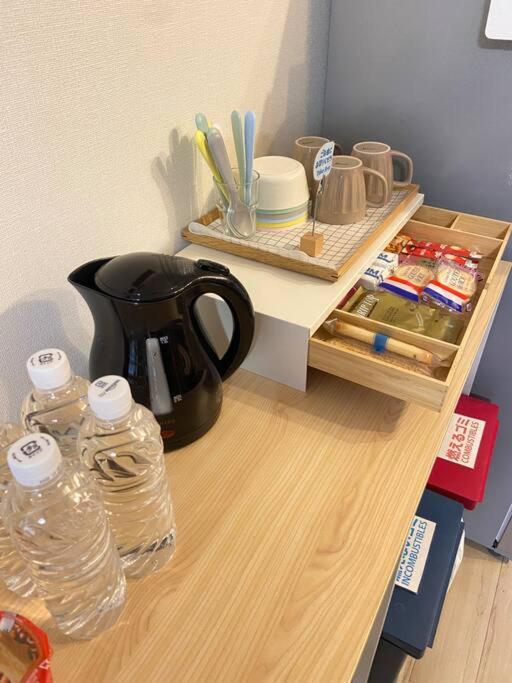 Příslušenství pro přípravu čaje a kávy v ubytování 名古屋城に1番近い名古屋市北区若鶴民泊