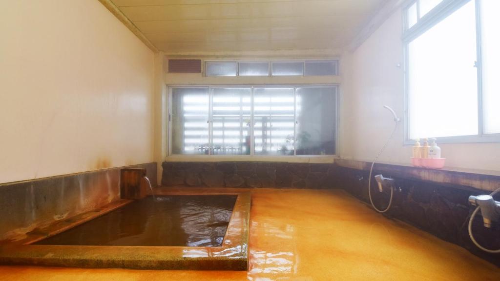 Fotografie z fotogalerie ubytování 関温泉 吉野屋温泉旅館 v destinaci Myoko