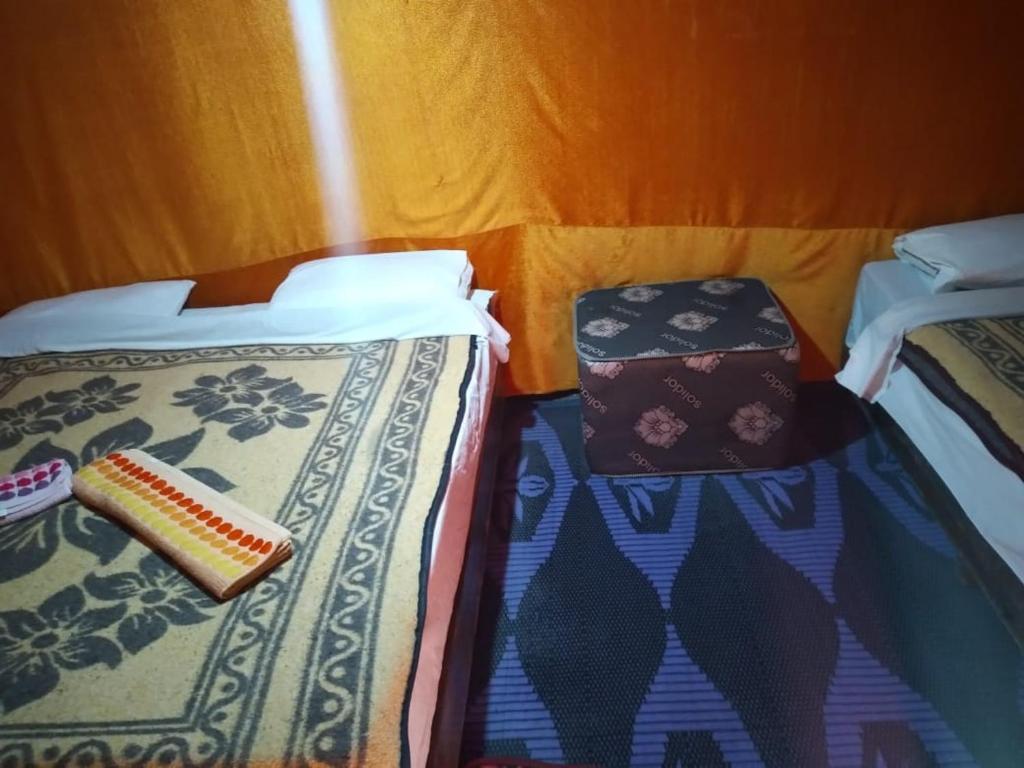 Postel nebo postele na pokoji v ubytování Nomad Bivouac