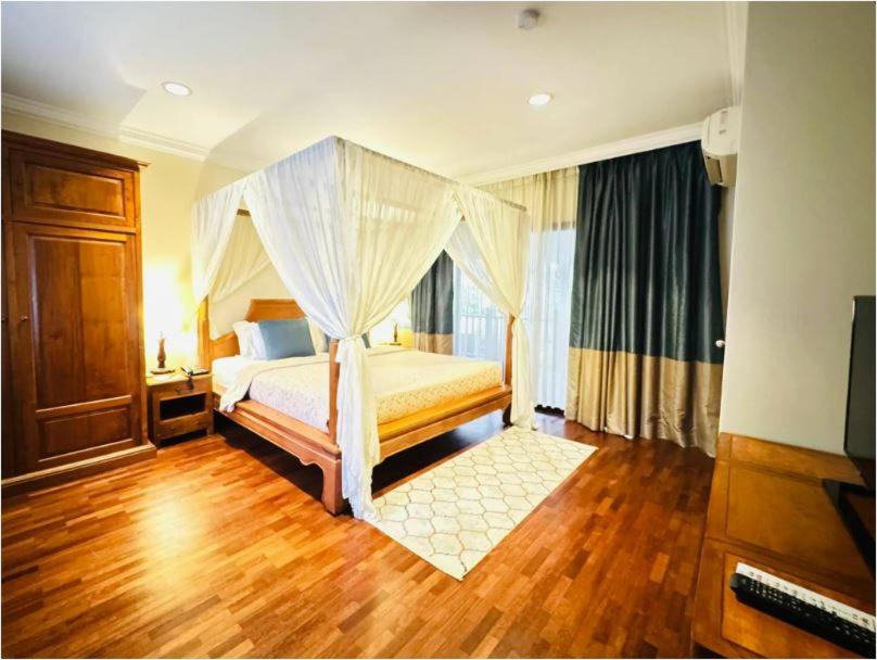 Postel nebo postele na pokoji v ubytování Cyberview Resort & Spa