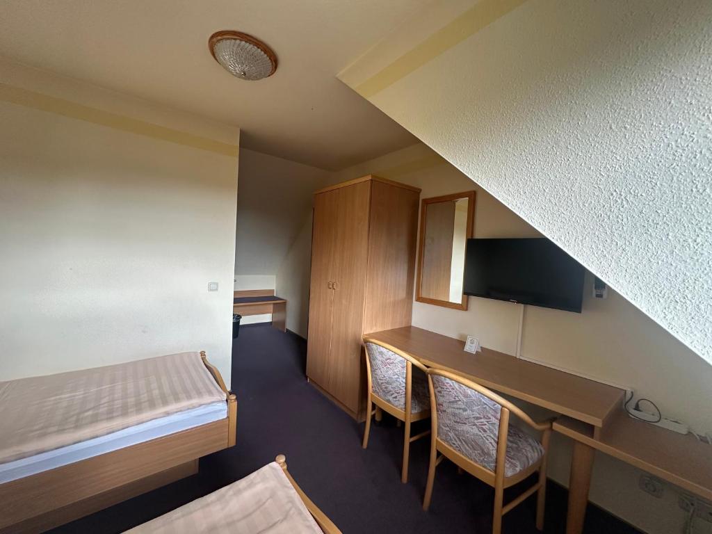 Postel nebo postele na pokoji v ubytování Pension und Monteurzimmer mit Küche und Waschmaschine
