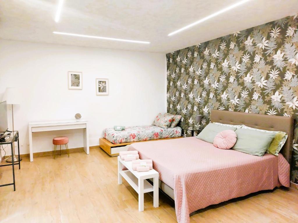 Postel nebo postele na pokoji v ubytování DN Holiday House