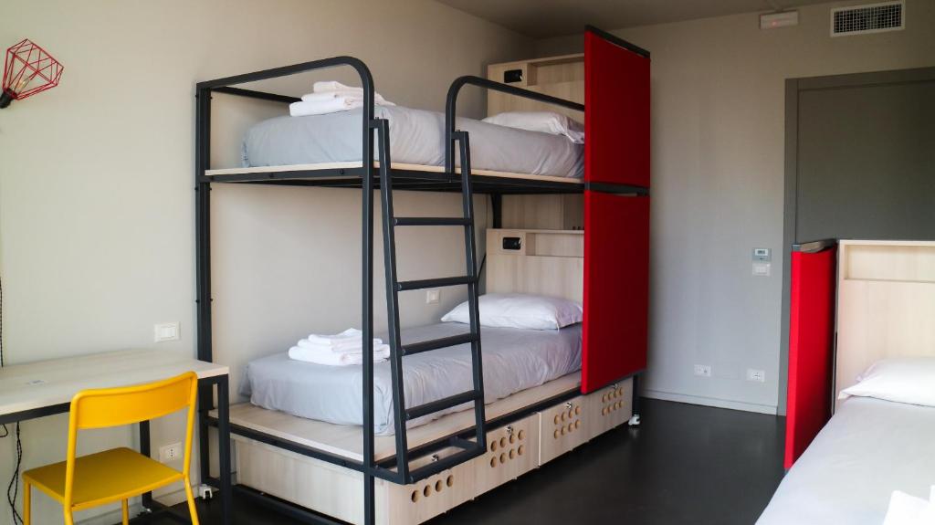 Postel nebo postele na pokoji v ubytování Le Magnolie