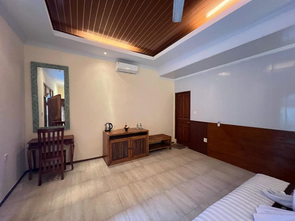 Postel nebo postele na pokoji v ubytování Pakis private room in Ubud 2