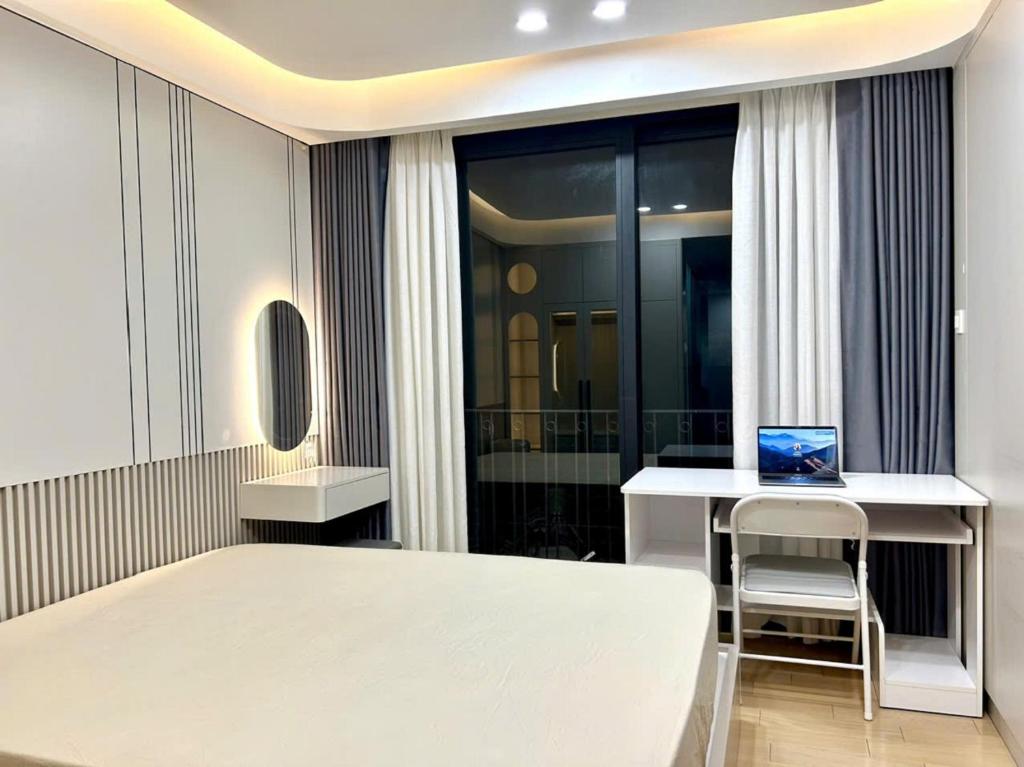 TV a/nebo společenská místnost v ubytování HOD Apartment Tan Dinh