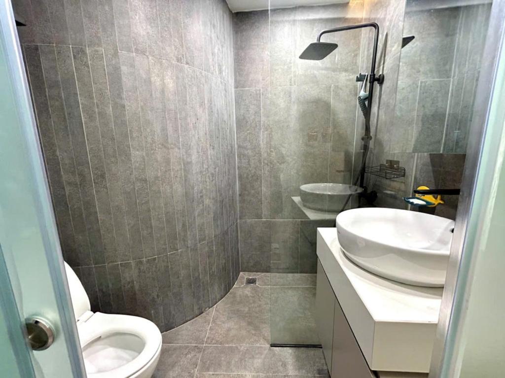 Koupelna v ubytování HOD Apartment Tan Dinh