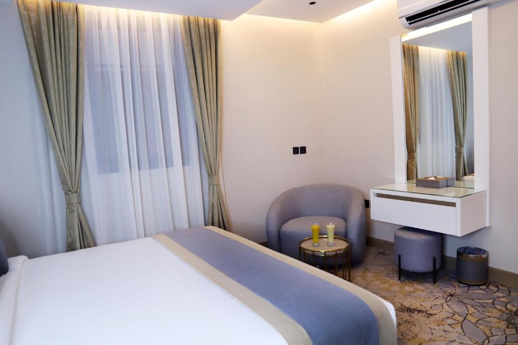 Postel nebo postele na pokoji v ubytování Ramadi Hotel